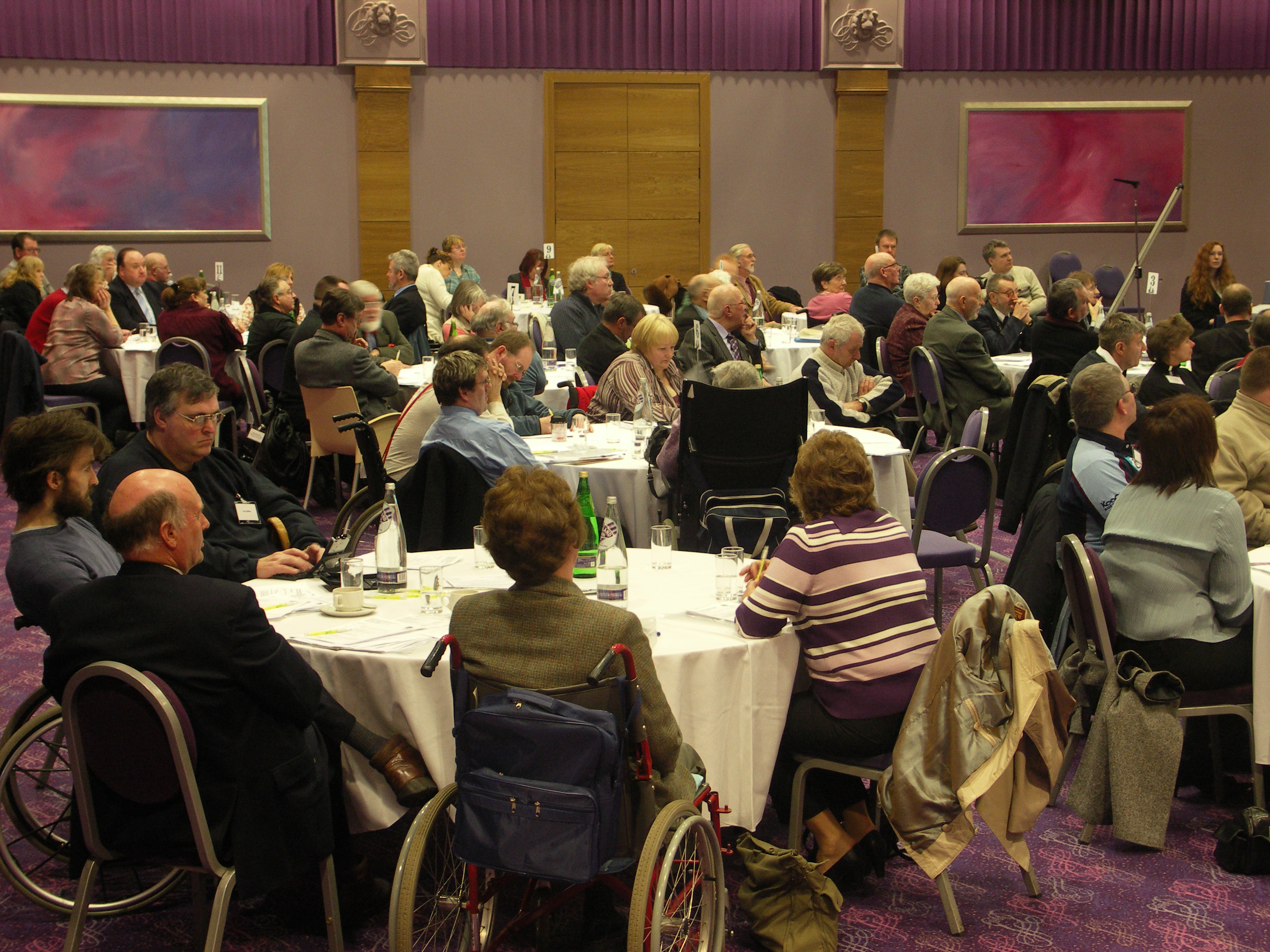 Delegates at the Access Panel Conference sitting at round tables
